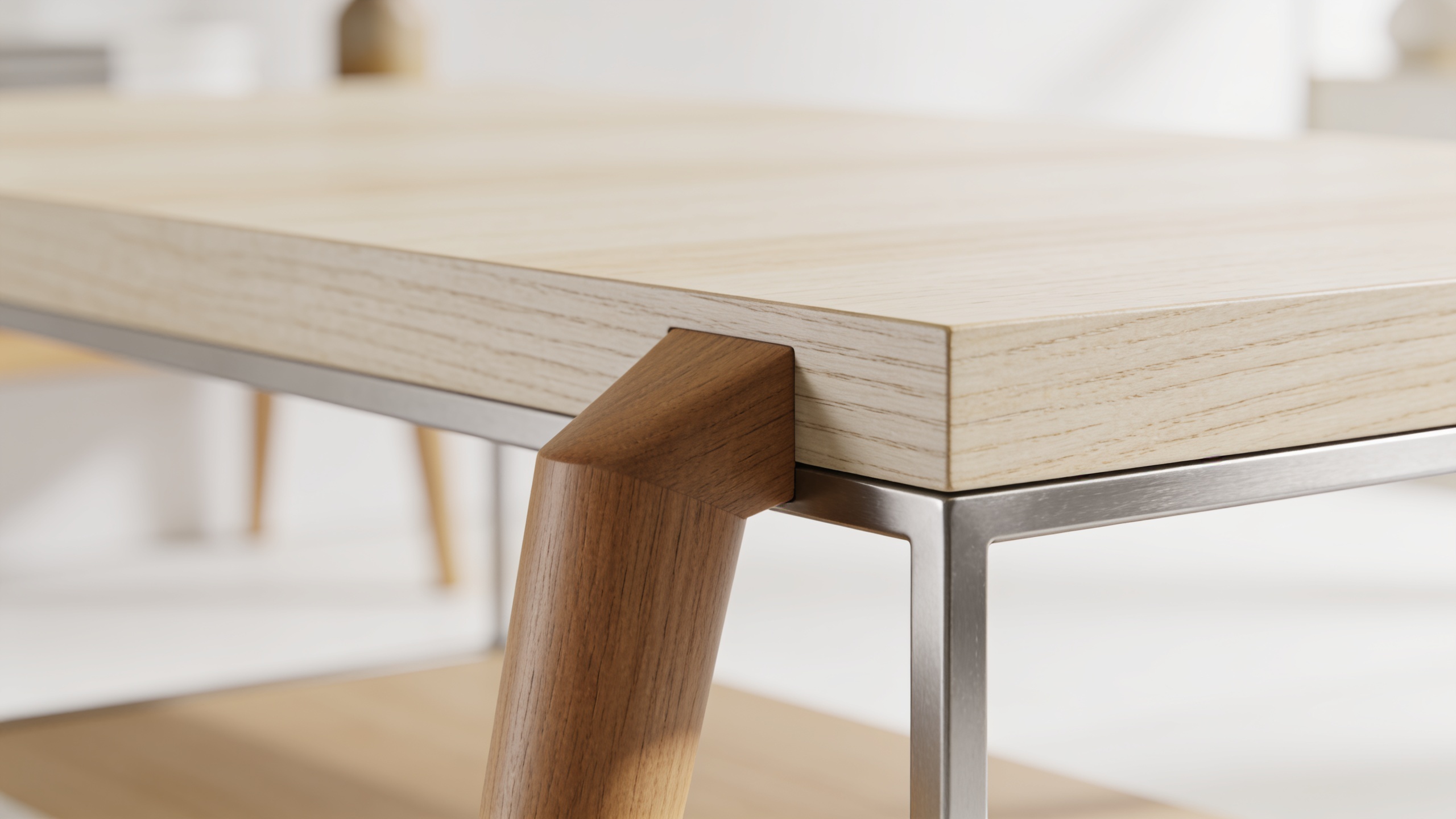 Close-up of modern oak furniture showing smooth finish, pale tone, and tapered leg with minimal steel hardware detail