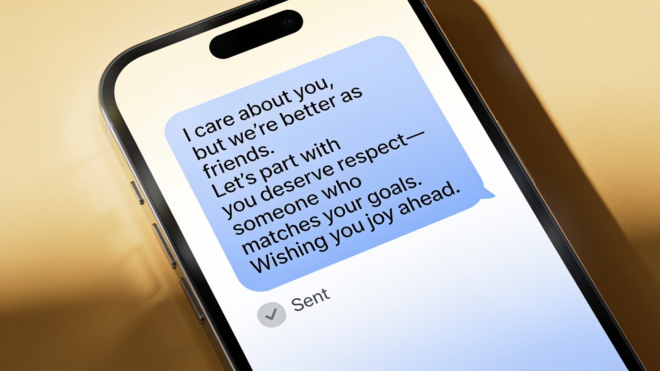 Example of a respectful, brief breakup message on a smartphone screen demonstrating good online dating etiquette and communication
